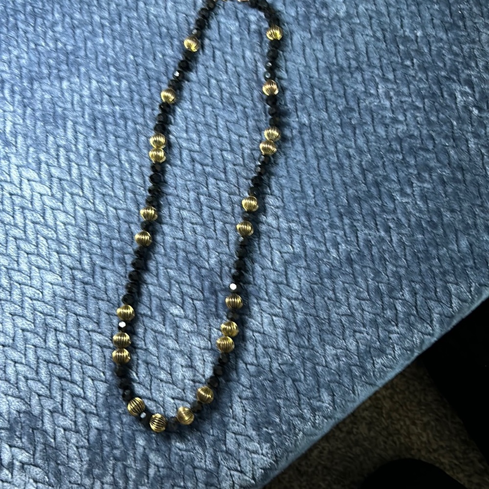 Classy black and gold beaded necklace.